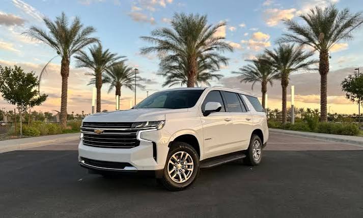 JRD's white Chevrolet Tahoe